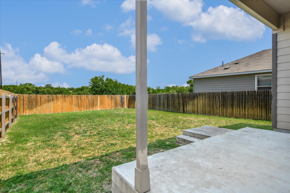 561 Greatest Gift Way Jarrell, TX 76537 - Photo 21 of 32 View of yard with a patio.