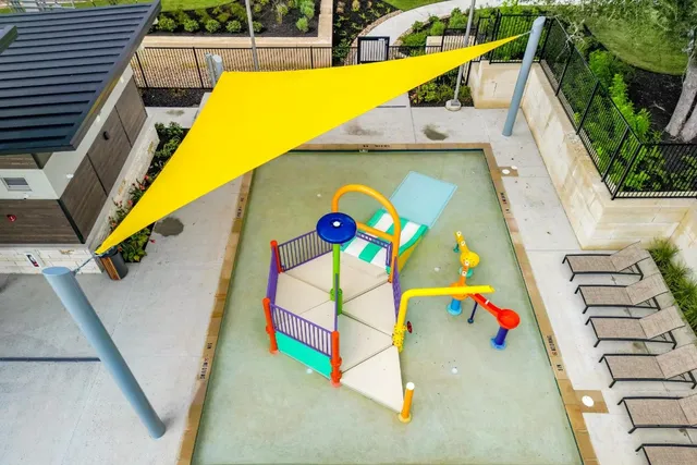 a view of a swimming pool with seating