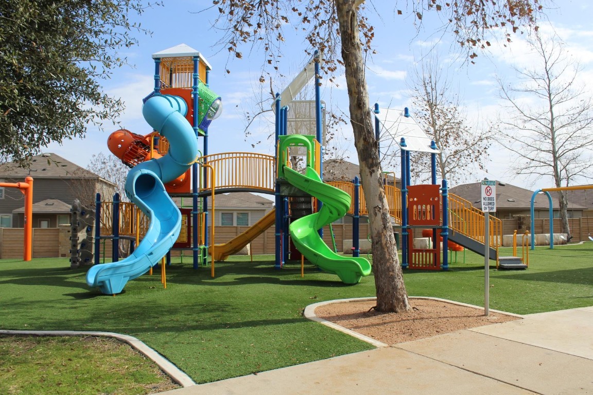 561 Greatest Gift Way Jarrell, TX 76537 - Photo 29 of 32 One of two playgrounds for children.