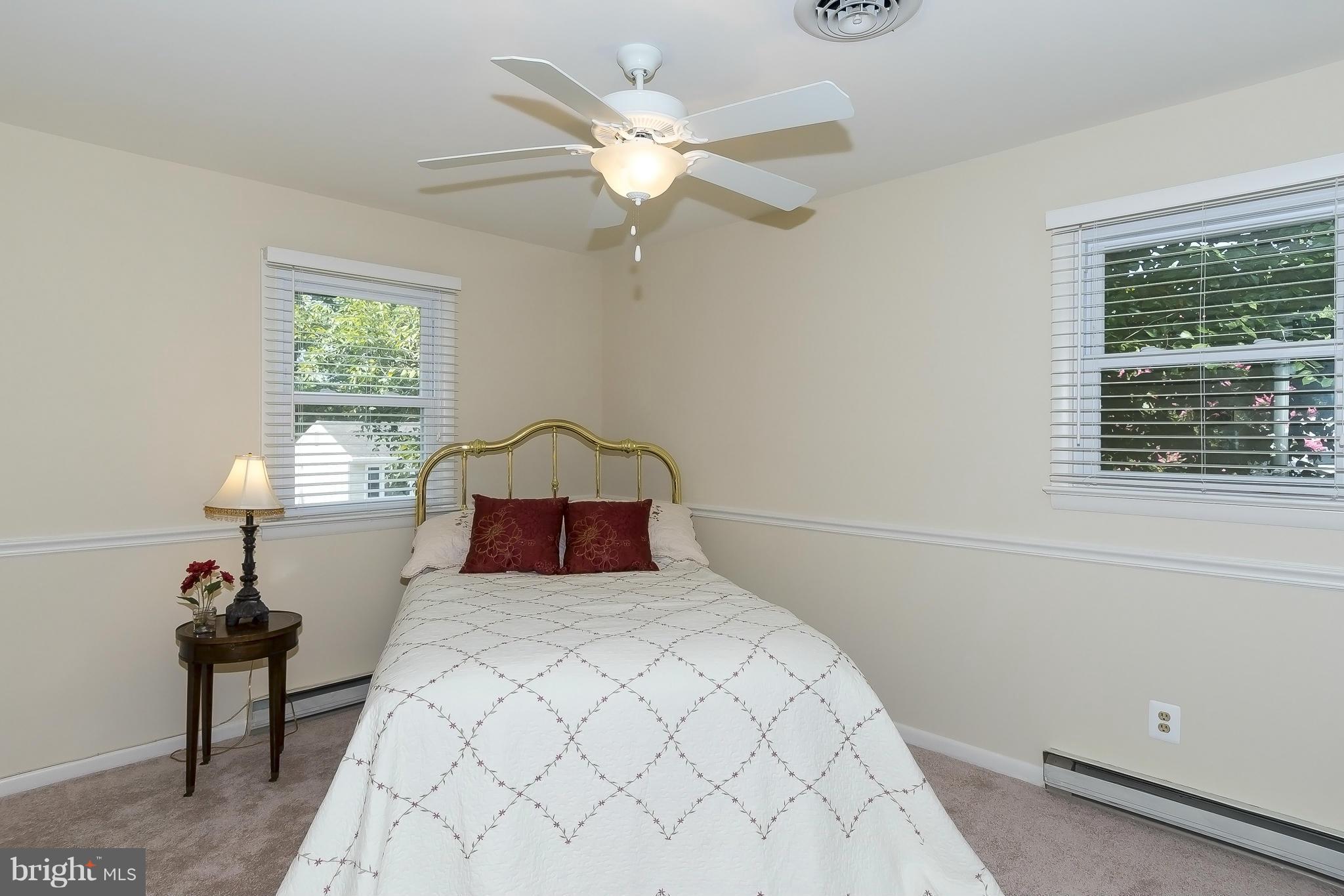 1747 Tacoma Road Edgewater, MD 21037 - Photo 13 of 19 a bedroom with a bed and window