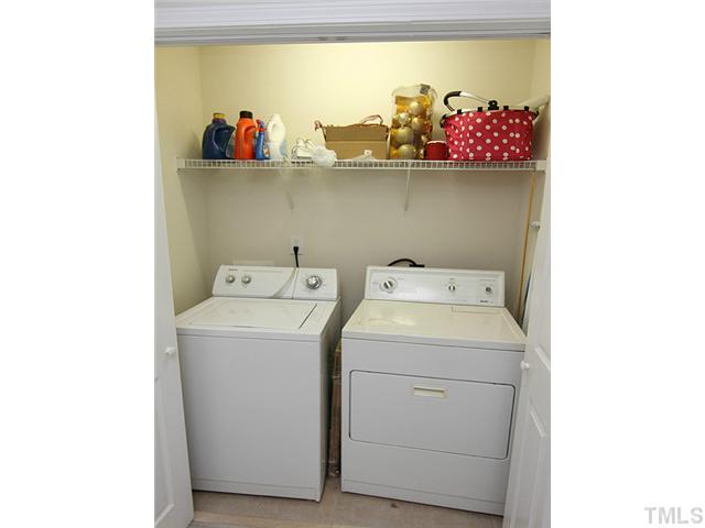 9712 Layla Avenue Raleigh, NC 27617 - Photo 22 of 25 a utility room with dryer and washer