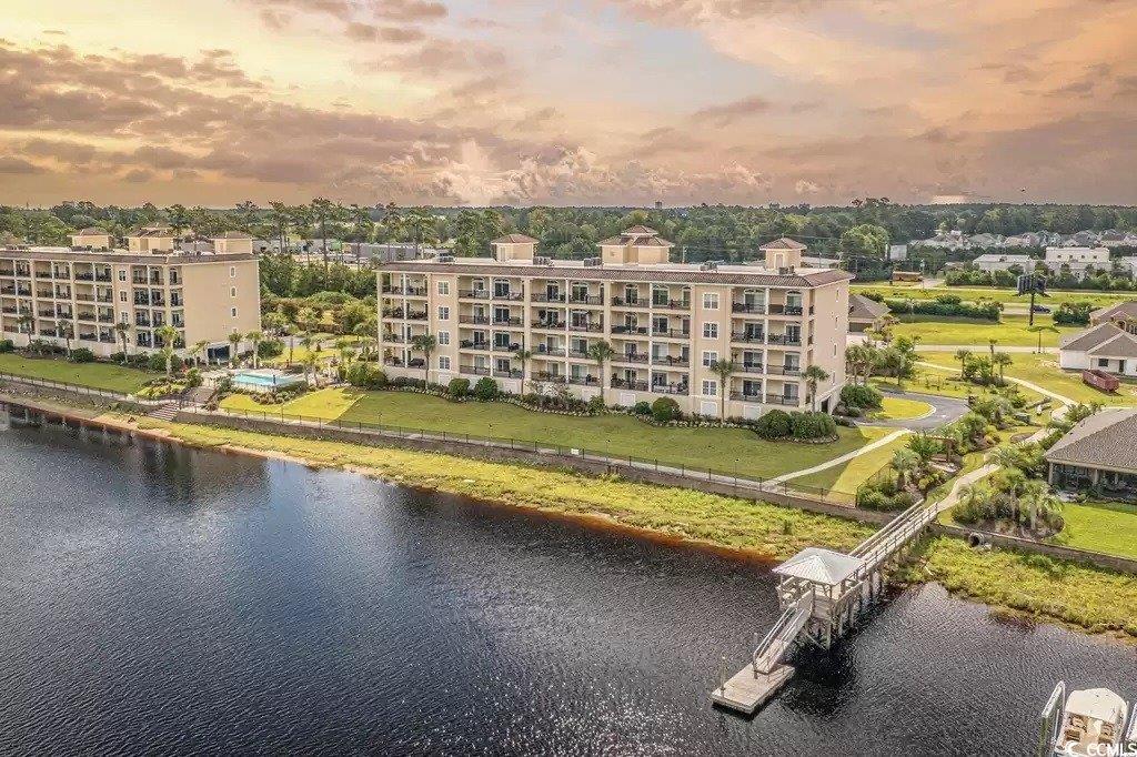 249 Venice Way, Unit 3105 Myrtle Beach, SC 29577 - Photo 39 of 40 Aerial view at dusk with a water view