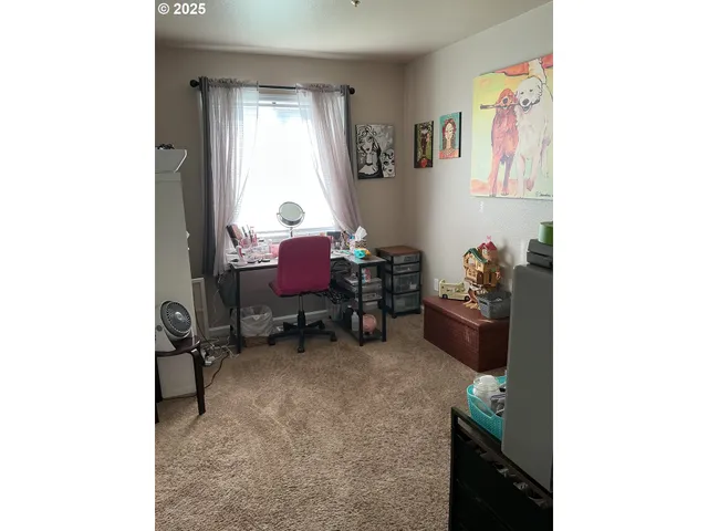 a room with furniture and a window