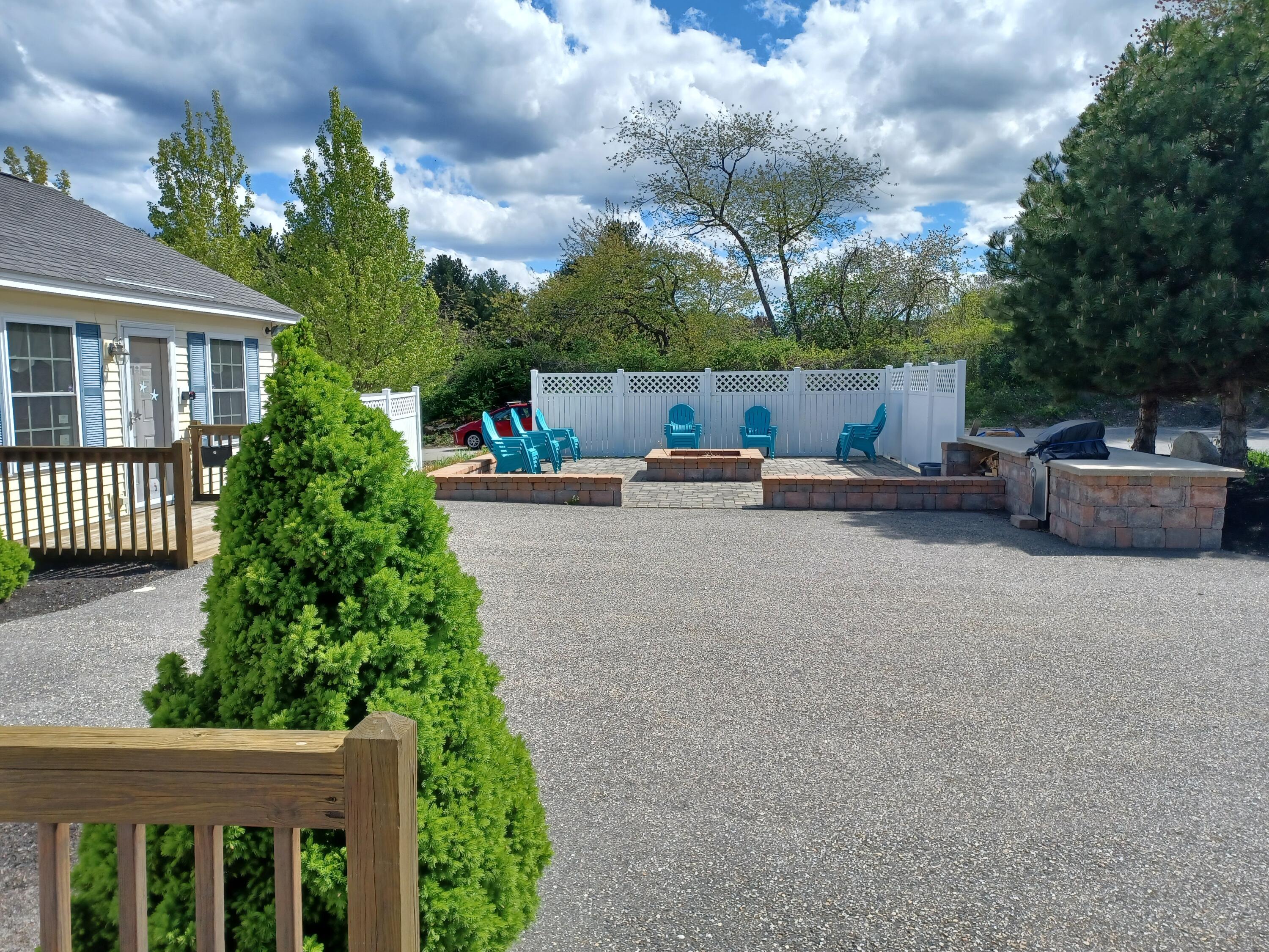 35 Barefoot Cottage Road, Unit 112 Wells, ME 04090 - Photo 18 of 30 15. Clubhouse & Firepit Area with Grill