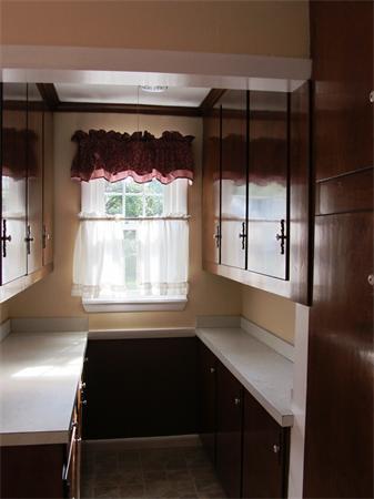 23 Gillette Avenue Springfield, MA 01118 - Photo 8 of 30 a kitchen with a window a sink and a window