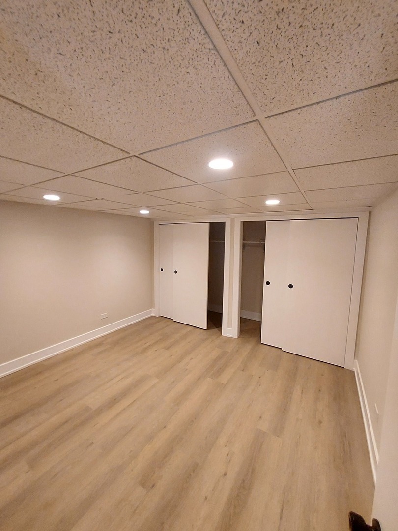 1001 North Dee Road, Unit A Park Ridge, IL 60068 - Photo 13 of 13 a view of an empty room with a window