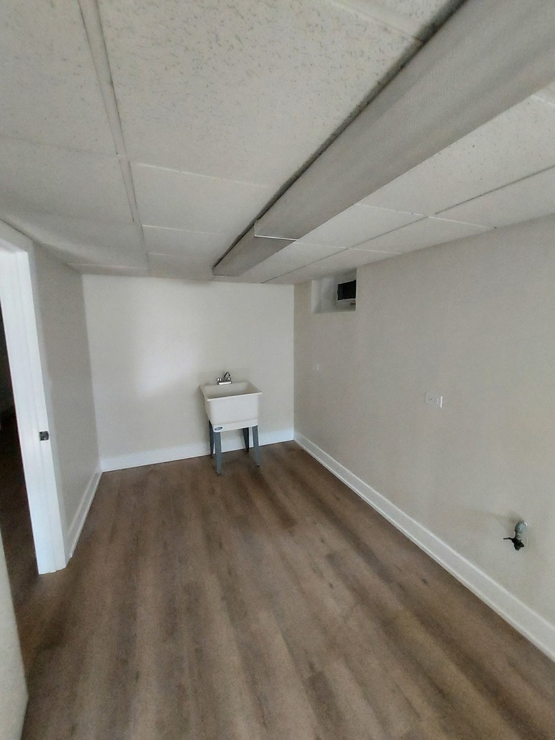 1001 North Dee Road, Unit A Park Ridge, IL 60068 - Photo 8 of 13 a view of an empty room and fire pit