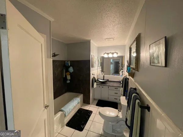 a bathroom with a sink and tub