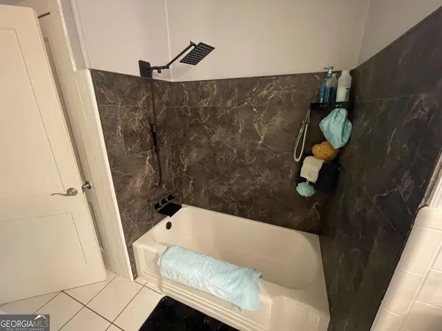 a view of a workspace with furniture