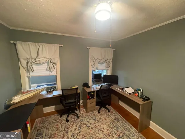 a bathroom with sink and mirror