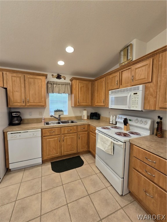 4950-17 Apache Road Golden Valley, AZ 86413 - Photo 34 of 100 a kitchen with a stove top oven sink and cabinets