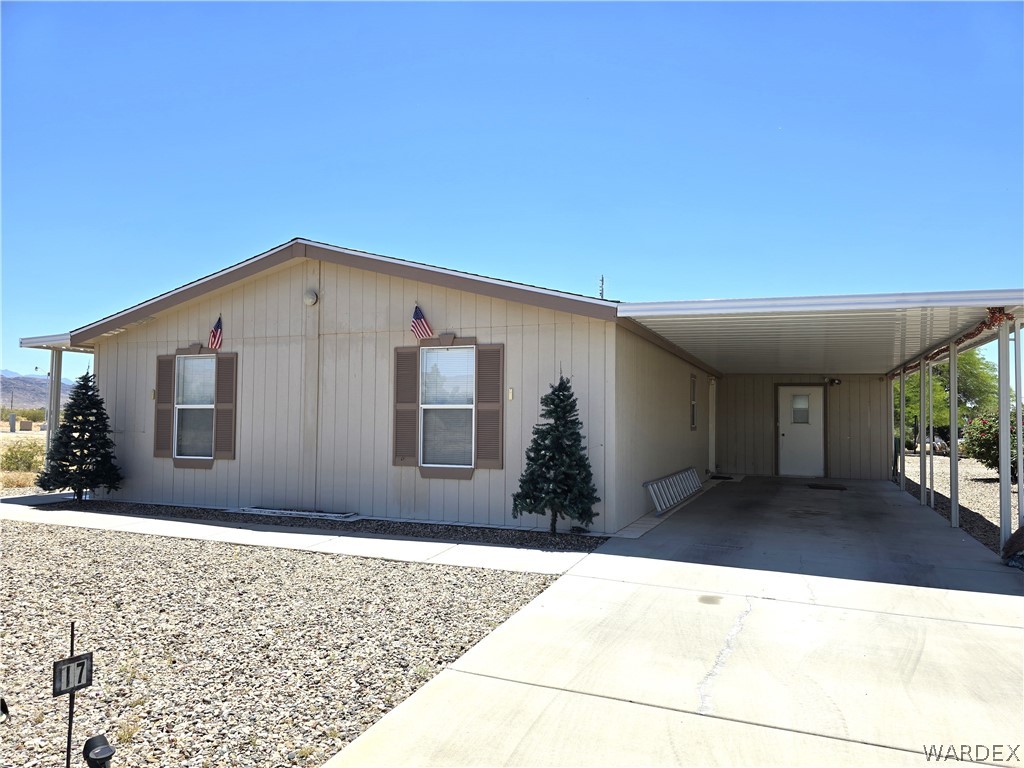 4950-17 Apache Road Golden Valley, AZ 86413 - Photo 4 of 100 a front view of a house