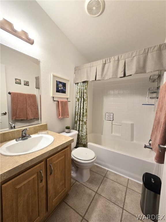 4950-17 Apache Road Golden Valley, AZ 86413 - Photo 71 of 100 a bathroom with a double vanity sink a mirror and a toilet