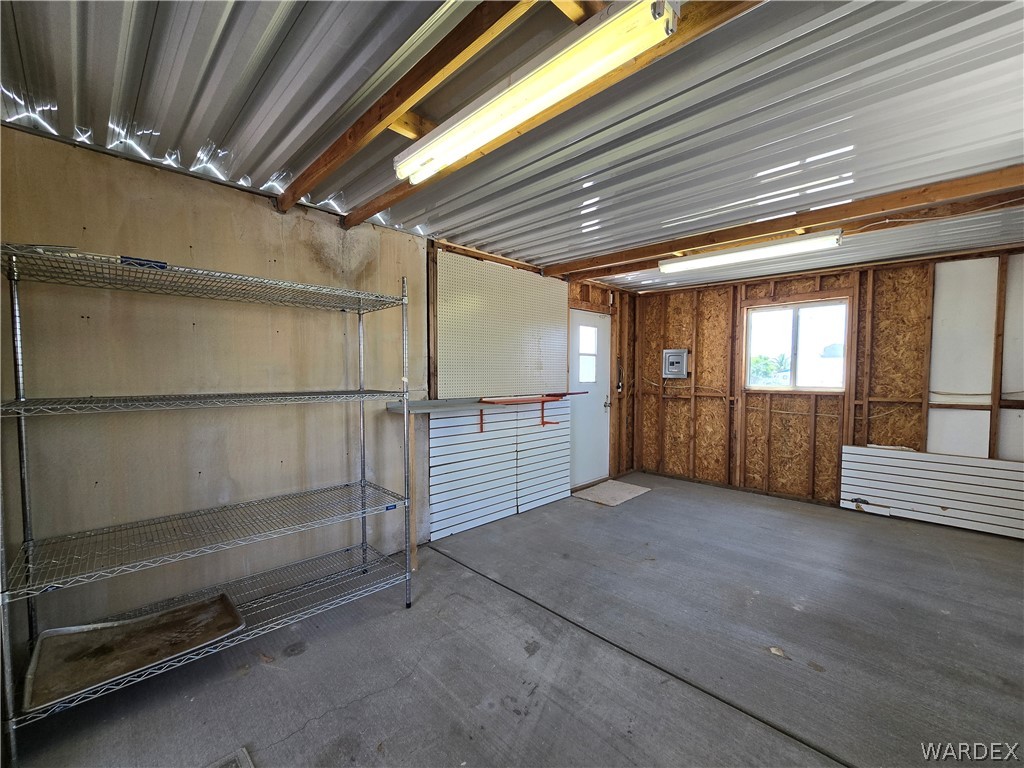 4950-17 Apache Road Golden Valley, AZ 86413 - Photo 9 of 100 a view of an empty room with a window
