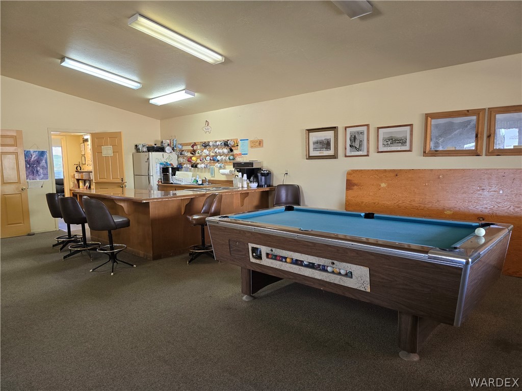 4950-17 Apache Road Golden Valley, AZ 86413 - Photo 91 of 100 a room with furniture pool table and a window