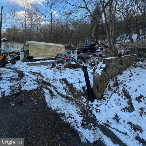 a view of a backyard of the house