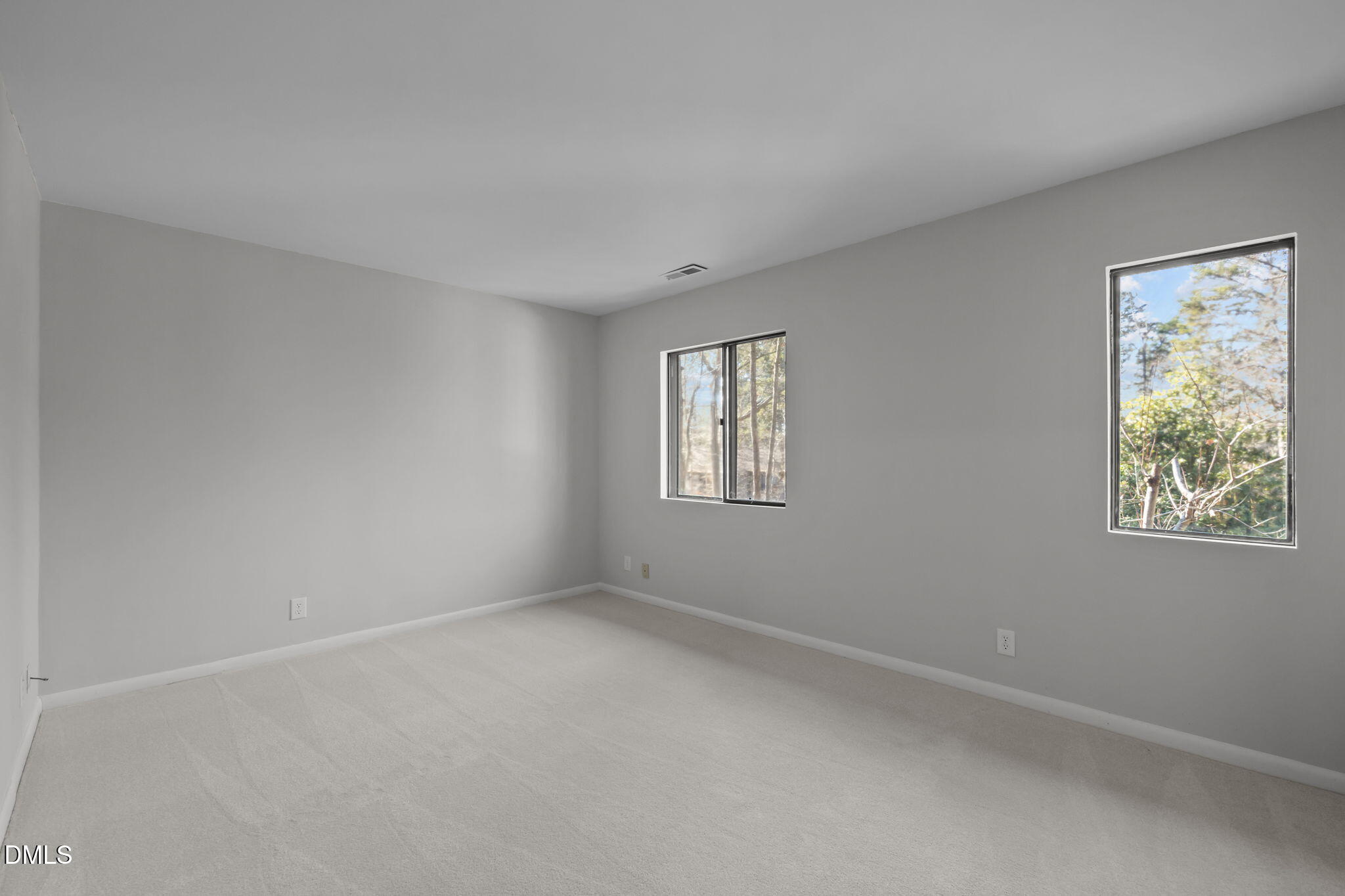 3080 Colony Road, Unit 3080C Durham, NC 27705 - Photo 24 of 57 a view of an empty room with a window