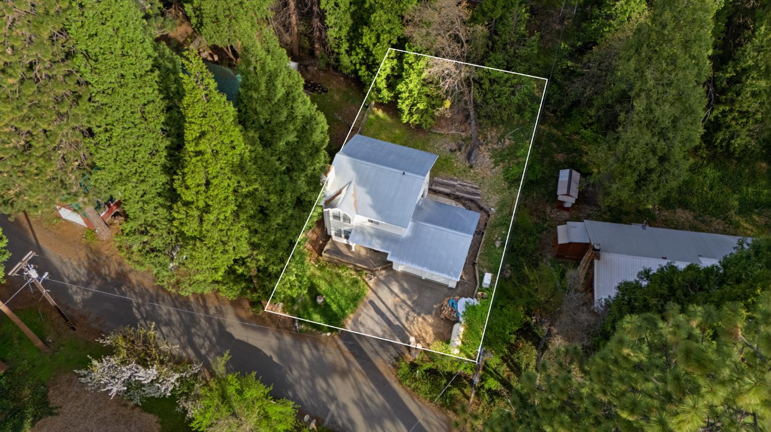 21 Spring Street Sierra City, CA 96125 - Photo 26 of 30 an aerial view of a house with a yard basket ball court and outdoor seating