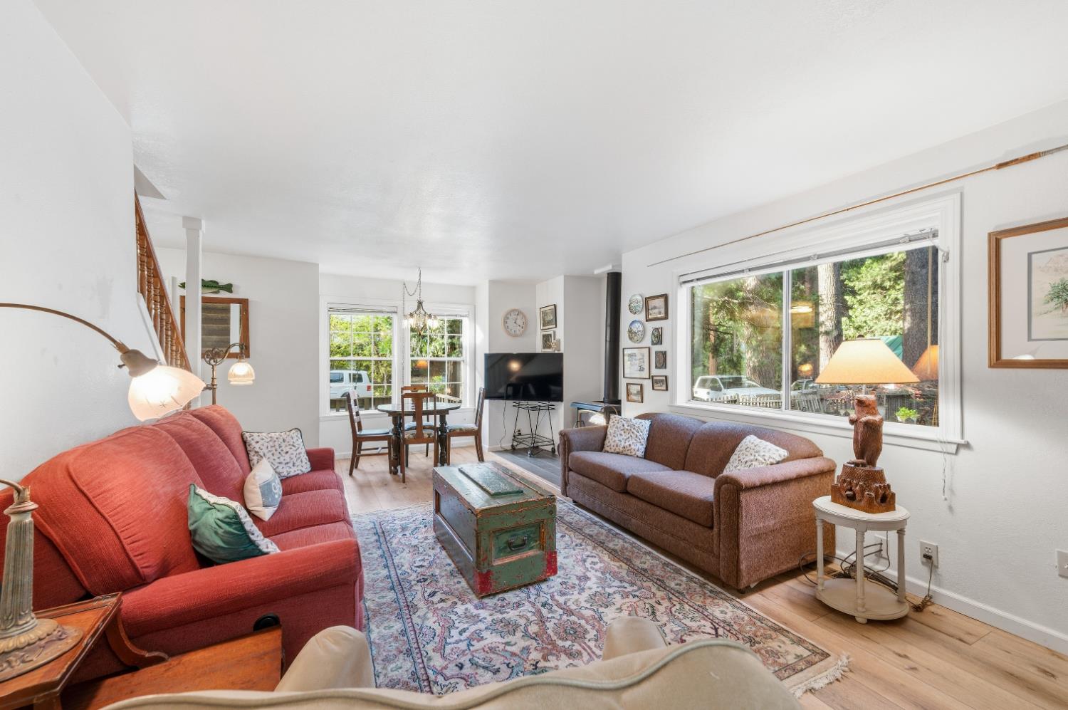 21 Spring Street Sierra City, CA 96125 - Photo 5 of 30 a living room with furniture wooden floor and a large window