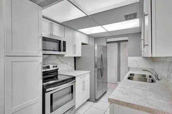 $185,000 | 6190 Woodlands Boulevard, Unit 311, Tamarac, FL 33319