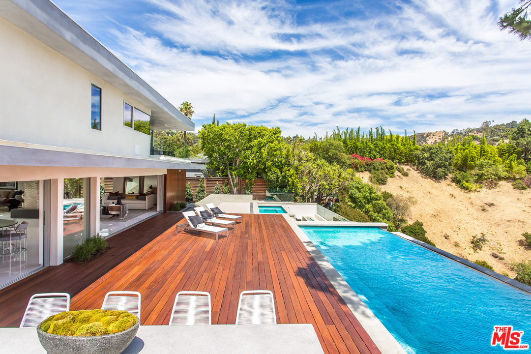 7524 Devista Drive Los Angeles, CA 90046 - Photo 22 of 54 a view of swimming pool with a patio