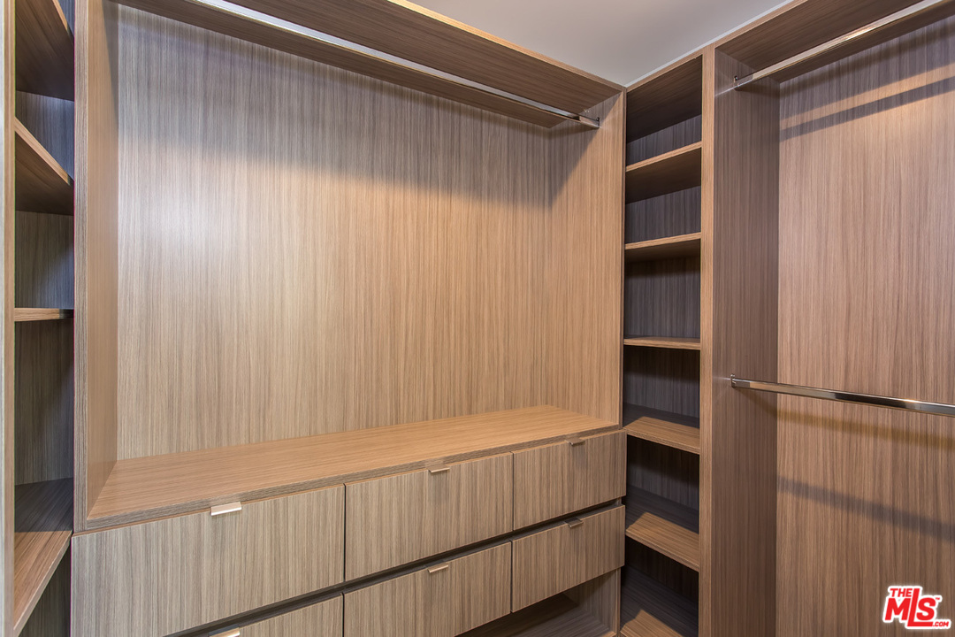 7524 Devista Drive Los Angeles, CA 90046 - Photo 37 of 54 a bathroom with a shower and a window