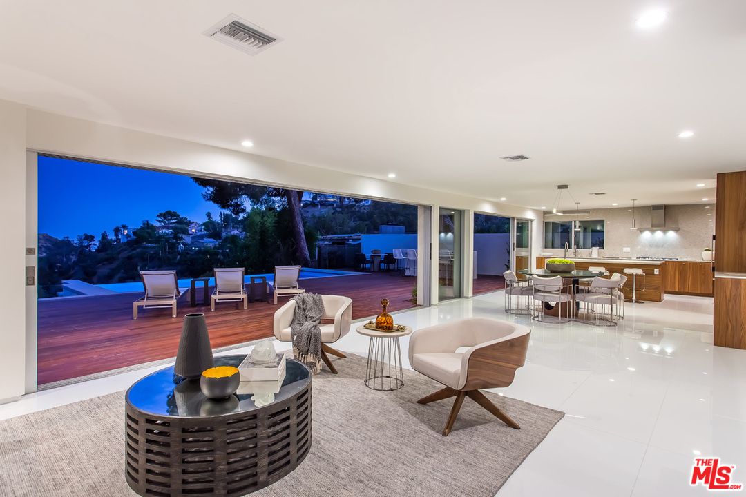 7524 Devista Drive Los Angeles, CA 90046 - Photo 43 of 54 a living room with furniture and a potted plant