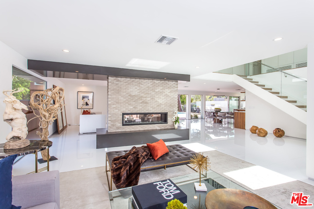 7524 Devista Drive Los Angeles, CA 90046 - Photo 6 of 54 a living room with furniture and a flat screen tv
