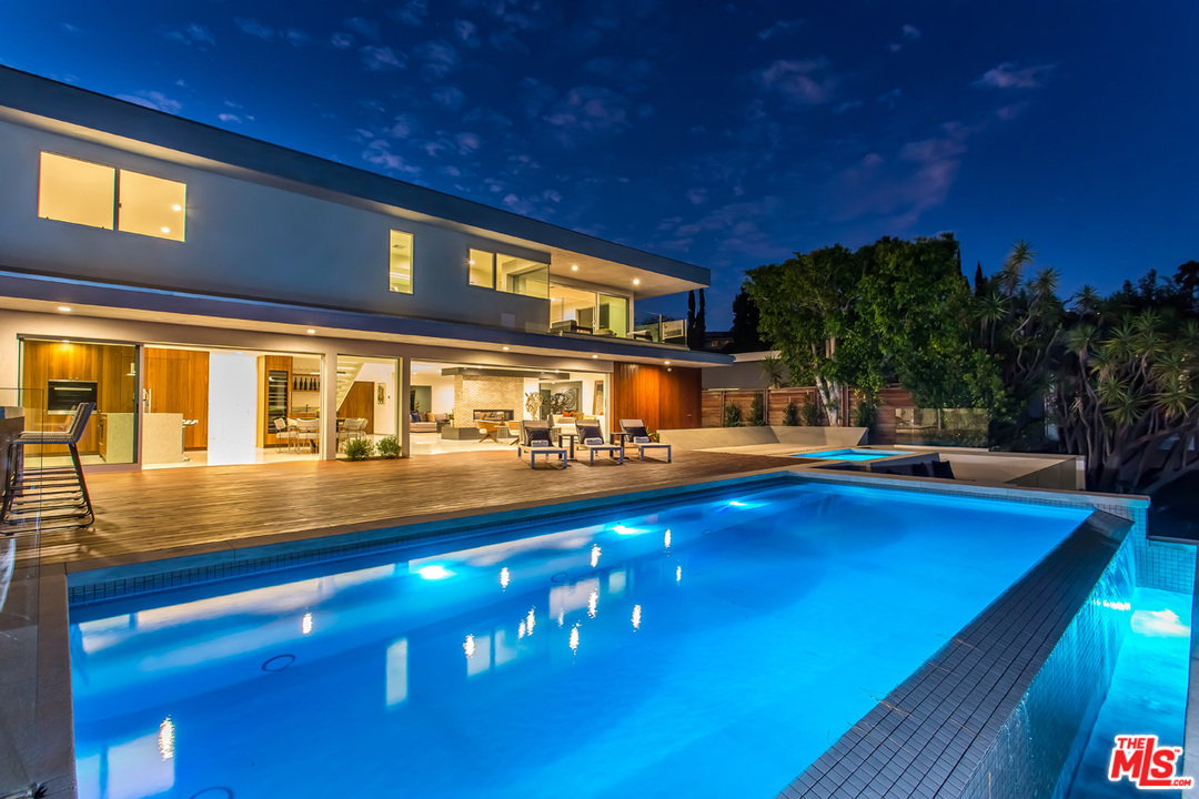 7524 Devista Drive Los Angeles, CA 90046 - Photo 52 of 54 a view of swimming pool with outdoor seating