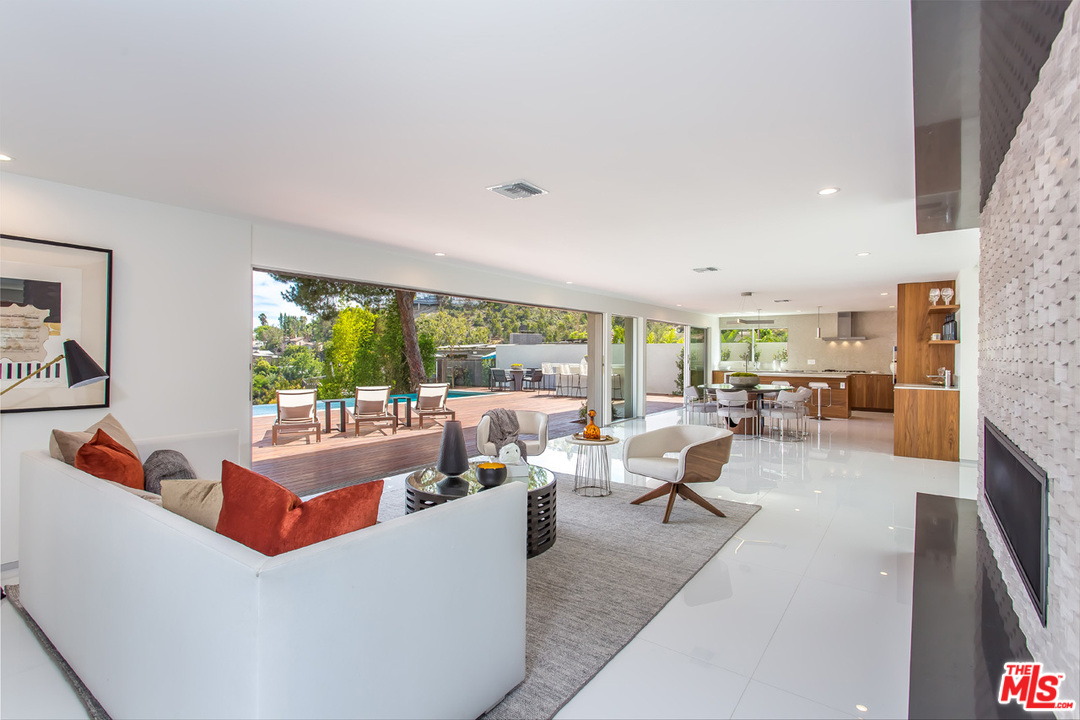 7524 Devista Drive Los Angeles, CA 90046 - Photo 7 of 54 a living room with furniture and a large window