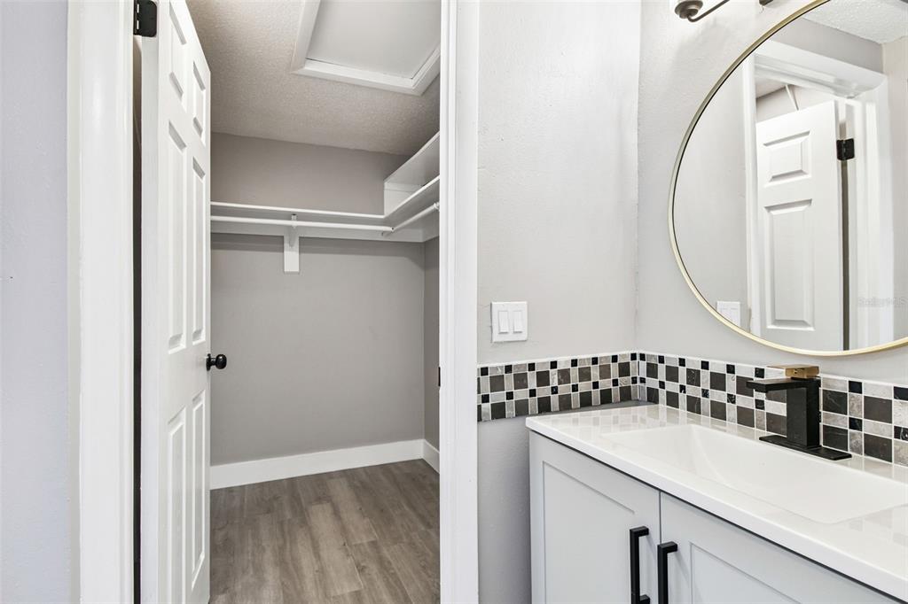 3800 Darlington Road Holiday, FL 34691 - Photo 14 of 36 a bathroom with a sink and a mirror