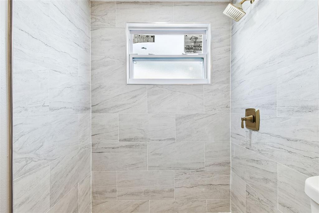 3800 Darlington Road Holiday, FL 34691 - Photo 20 of 36 a bathroom with a window