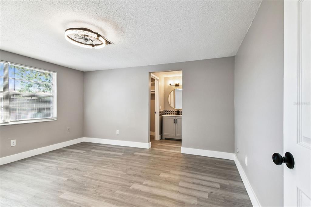 3800 Darlington Road Holiday, FL 34691 - Photo 9 of 36 a view of empty room with wooden floor