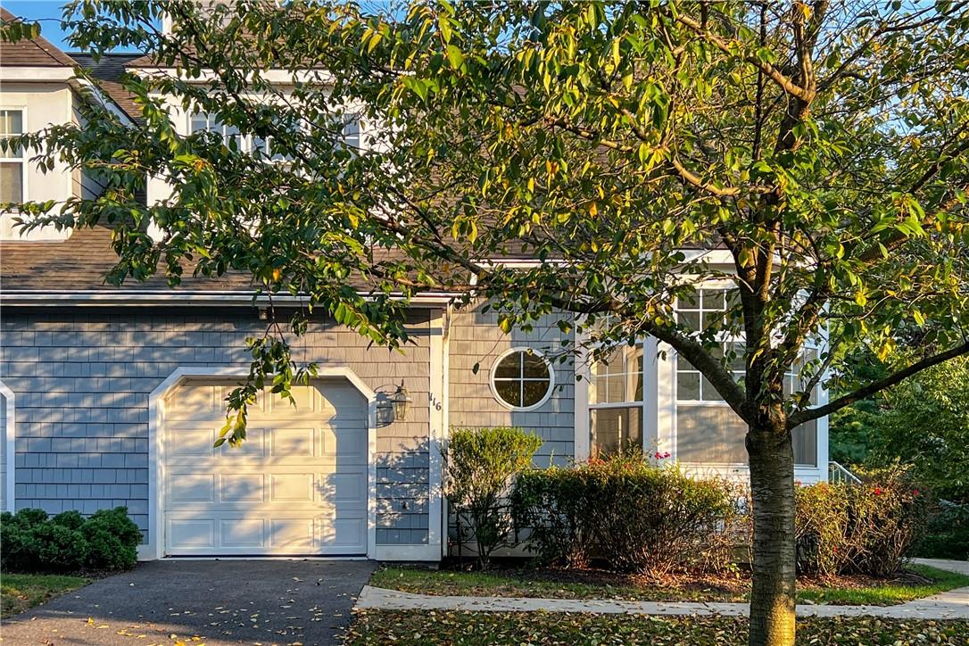 116 Mystic Drive Ossining, NY 10562 - Photo 1 of 1 The afternoon sun shines on the front of the condo