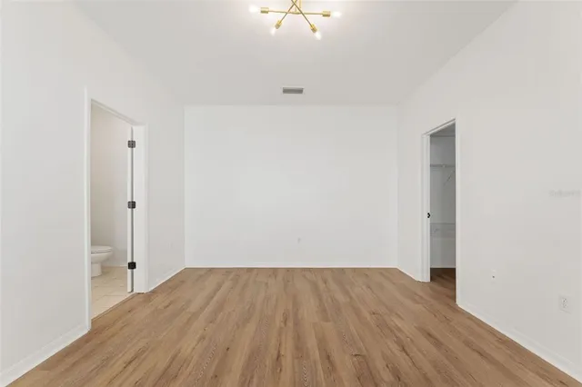 a bathroom with a sink a mirror and a bathtub