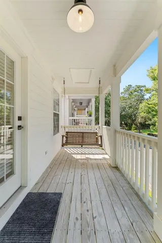 a front view of a house with a yard and a garage