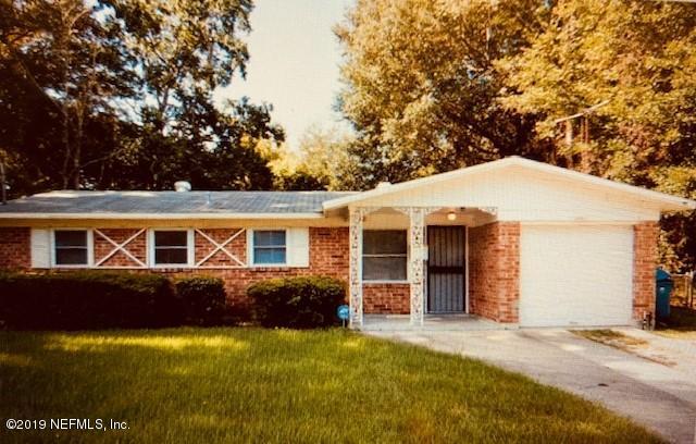 1904 Leonid Road Jacksonville, FL 32218 - Photo 1 of 1 front view of a house with a yard