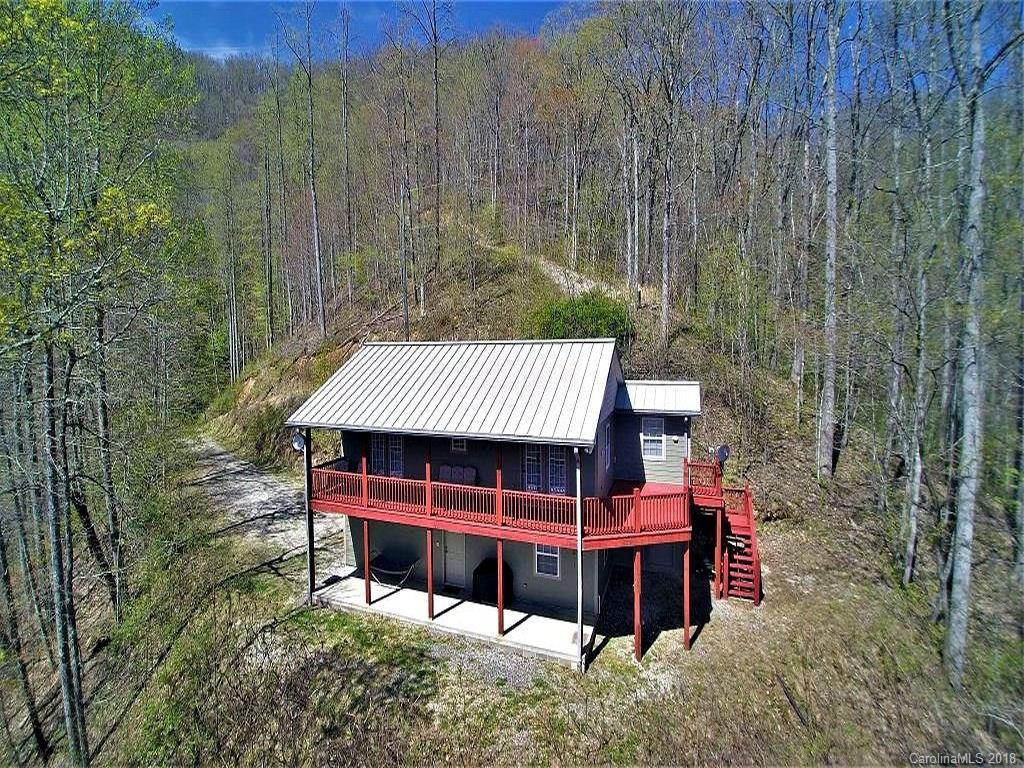 624 Carpenter Road Bryson City, NC 28713 - Photo 1 of 33 a view of a deck with a yard