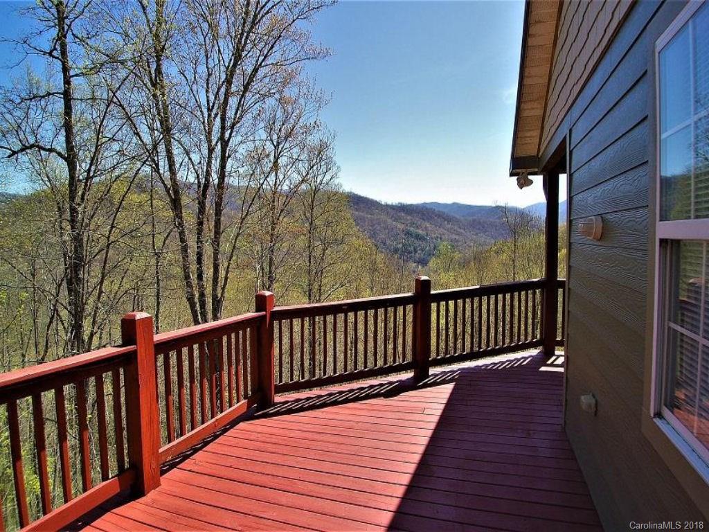 624 Carpenter Road Bryson City, NC 28713 - Photo 2 of 33 a view of balcony with wooden floor and fence