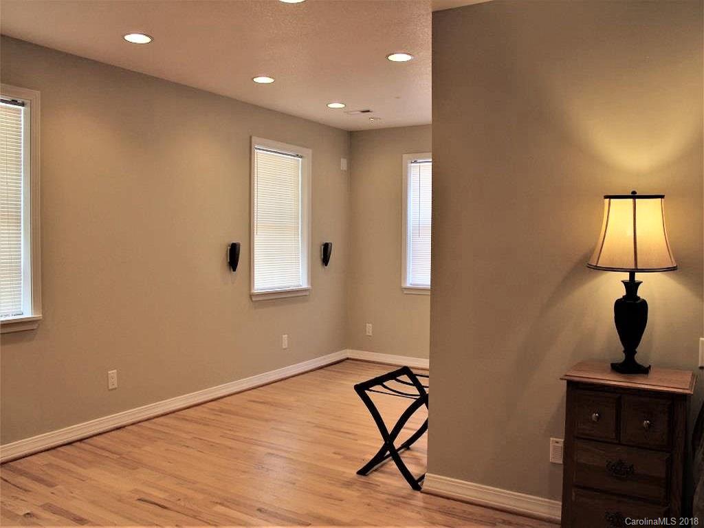 624 Carpenter Road Bryson City, NC 28713 - Photo 14 of 33 a view of a room with wooden floor cabinet and a window
