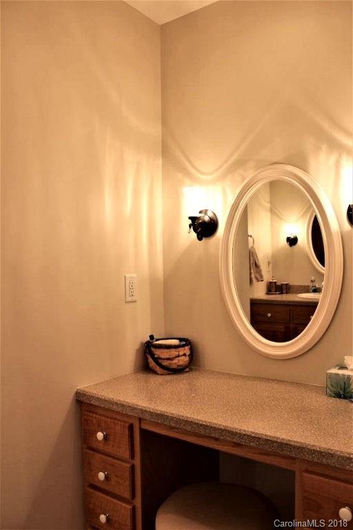 624 Carpenter Road Bryson City, NC 28713 - Photo 16 of 33 a bathroom with a sink and a mirror