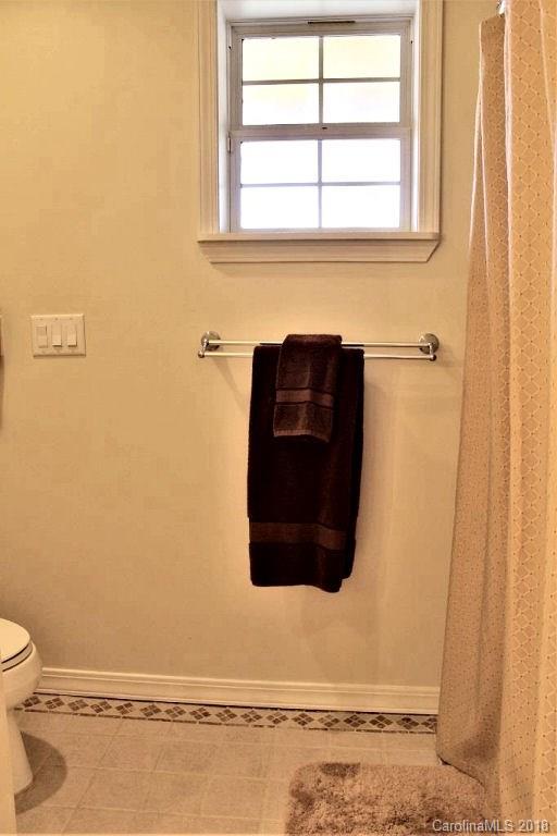 624 Carpenter Road Bryson City, NC 28713 - Photo 18 of 33 a bathroom with a sink and a toilet