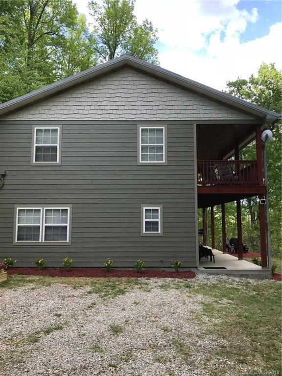 624 Carpenter Road Bryson City, NC 28713 - Photo 30 of 33 a brick house with a large windows