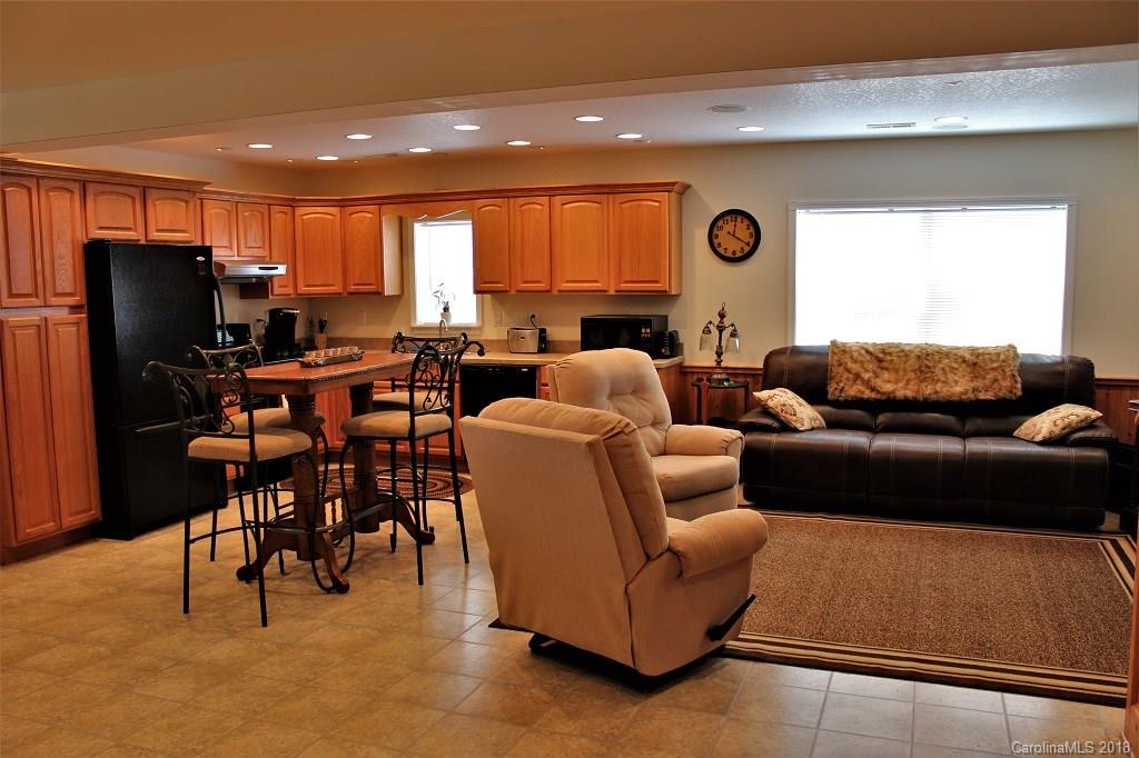 624 Carpenter Road Bryson City, NC 28713 - Photo 4 of 33 a living room with furniture and a large window