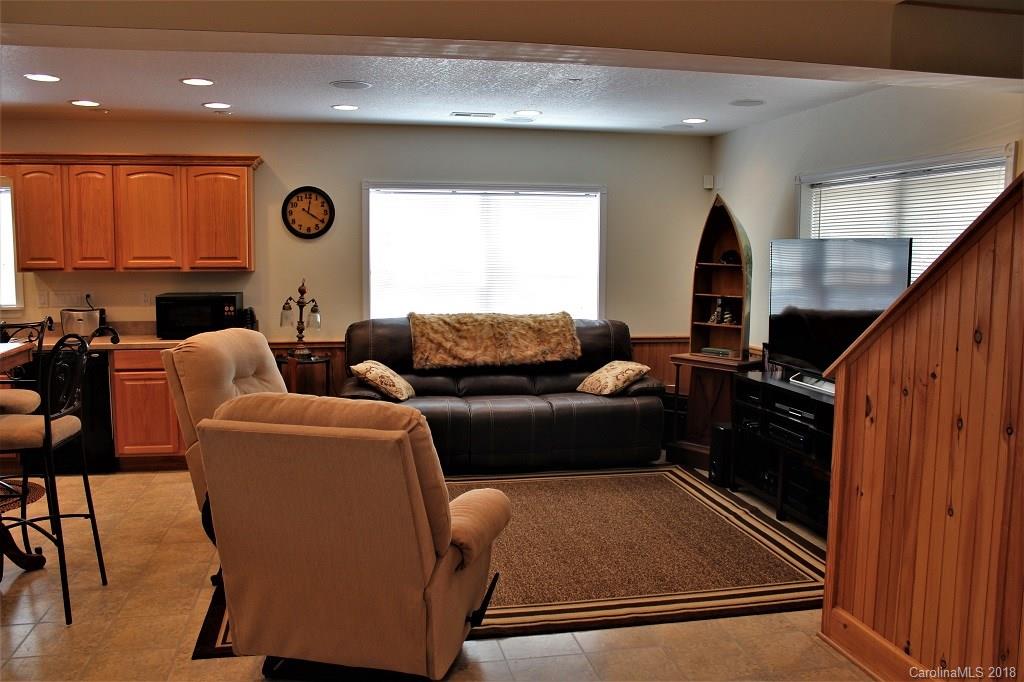 624 Carpenter Road Bryson City, NC 28713 - Photo 6 of 33 a living room with furniture and a window