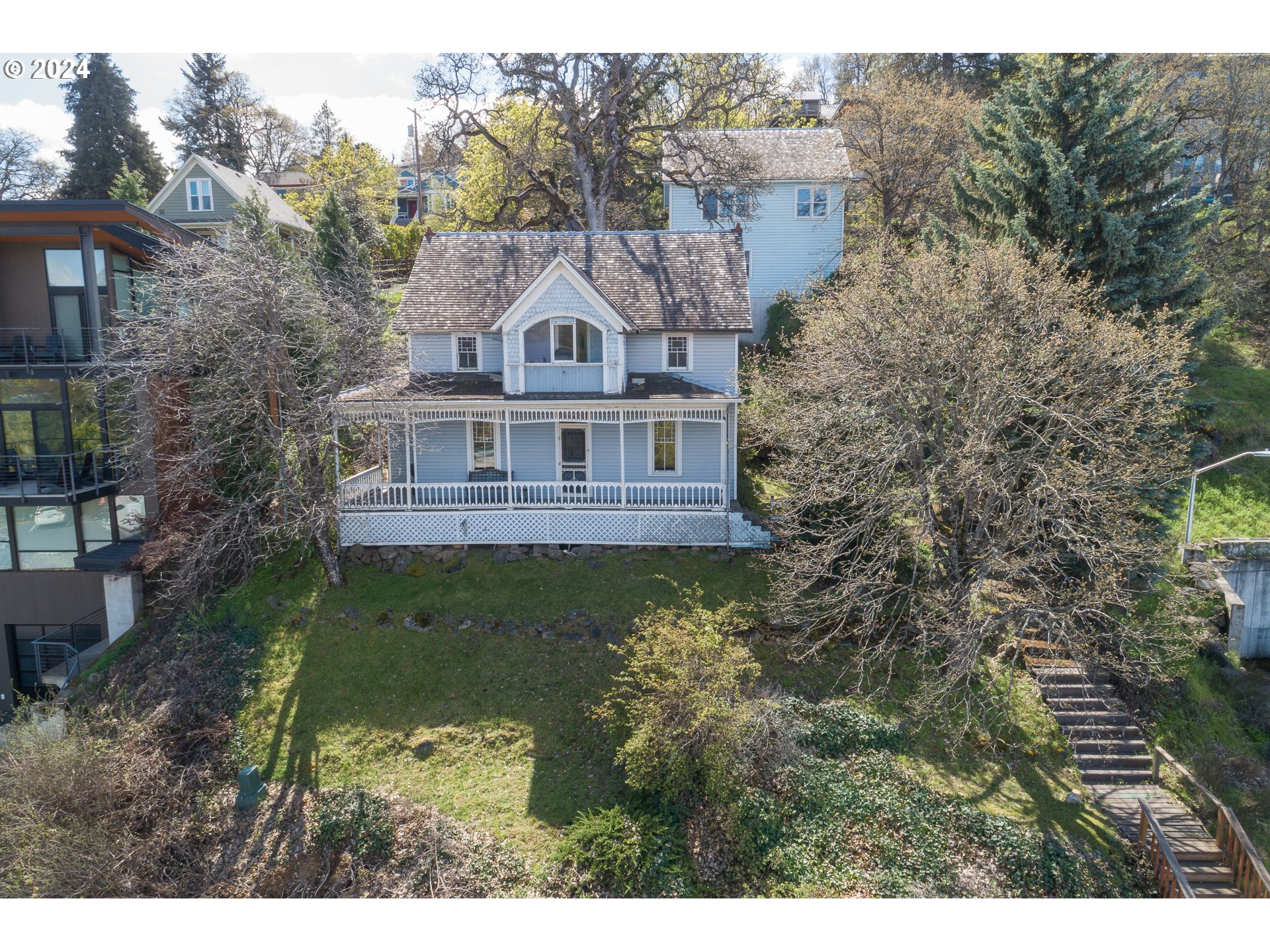 a view of a big yard next to a house