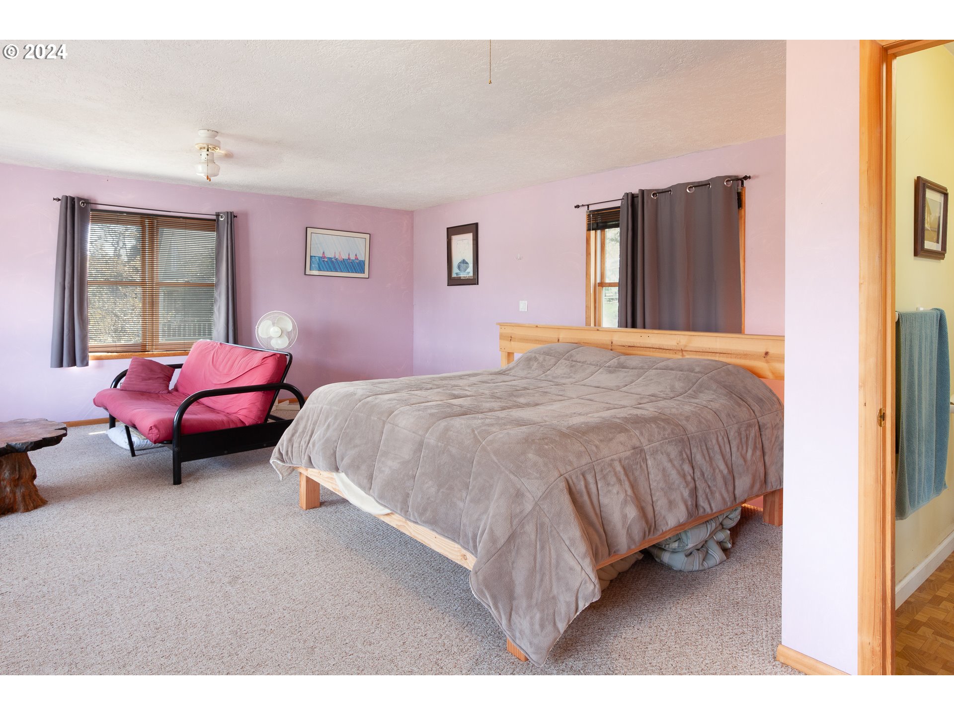 1 State Street Hood River, OR 97031 - Photo 17 of 47 a bedroom with a bed and window