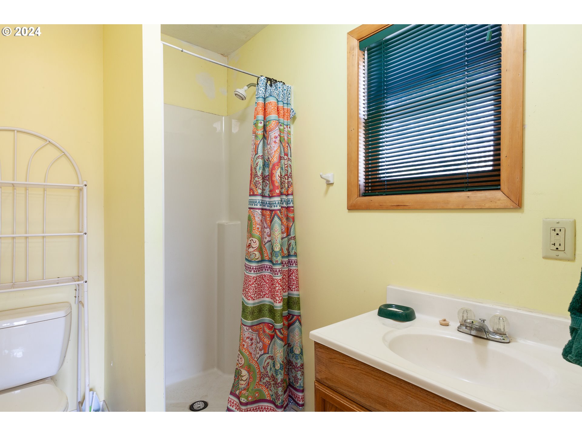 1 State Street Hood River, OR 97031 - Photo 19 of 47 a bathroom with a sink and a mirror