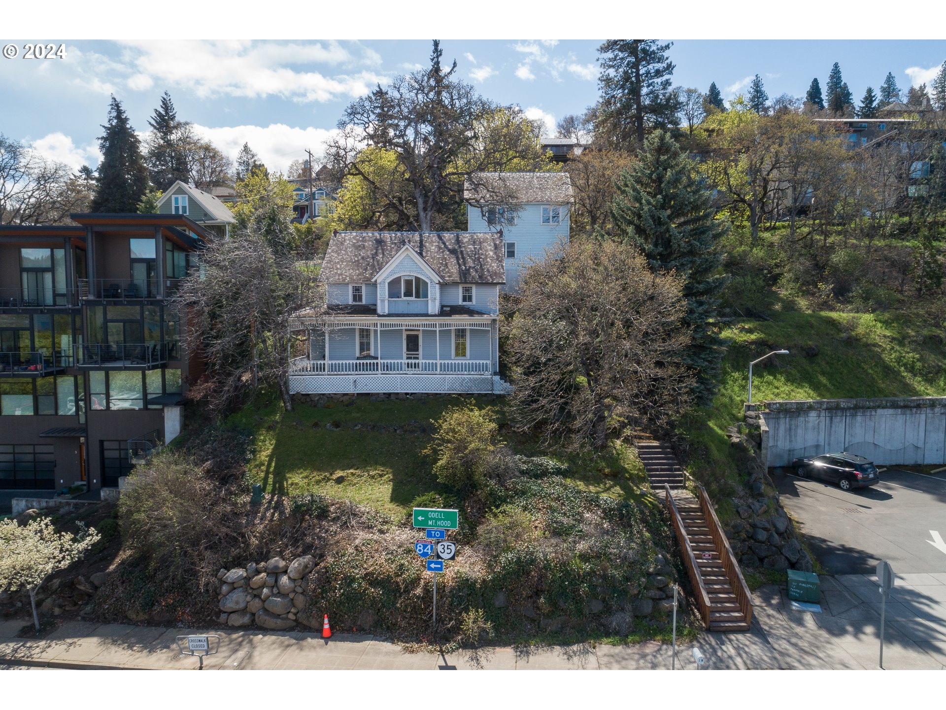 1 State Street Hood River, OR 97031 - Photo 2 of 47 a view of a house with a yard and plants