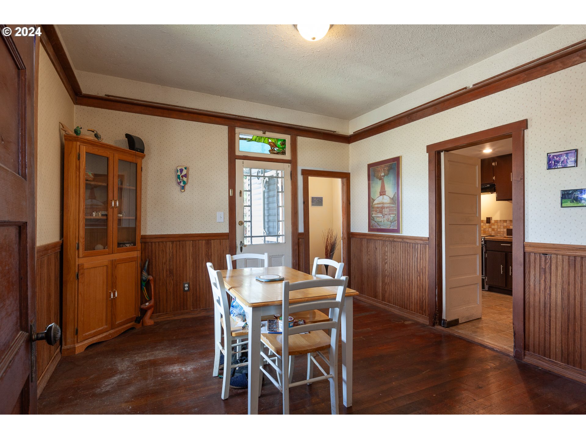 1 State Street Hood River, OR 97031 - Photo 36 of 47 a view of a dining room with furniture and wooden floor